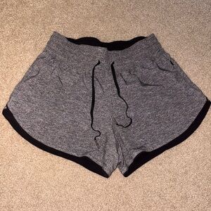 Brand: Lululemon shorts (reversible) 
Size: 6 (i think)
Color: black and grey